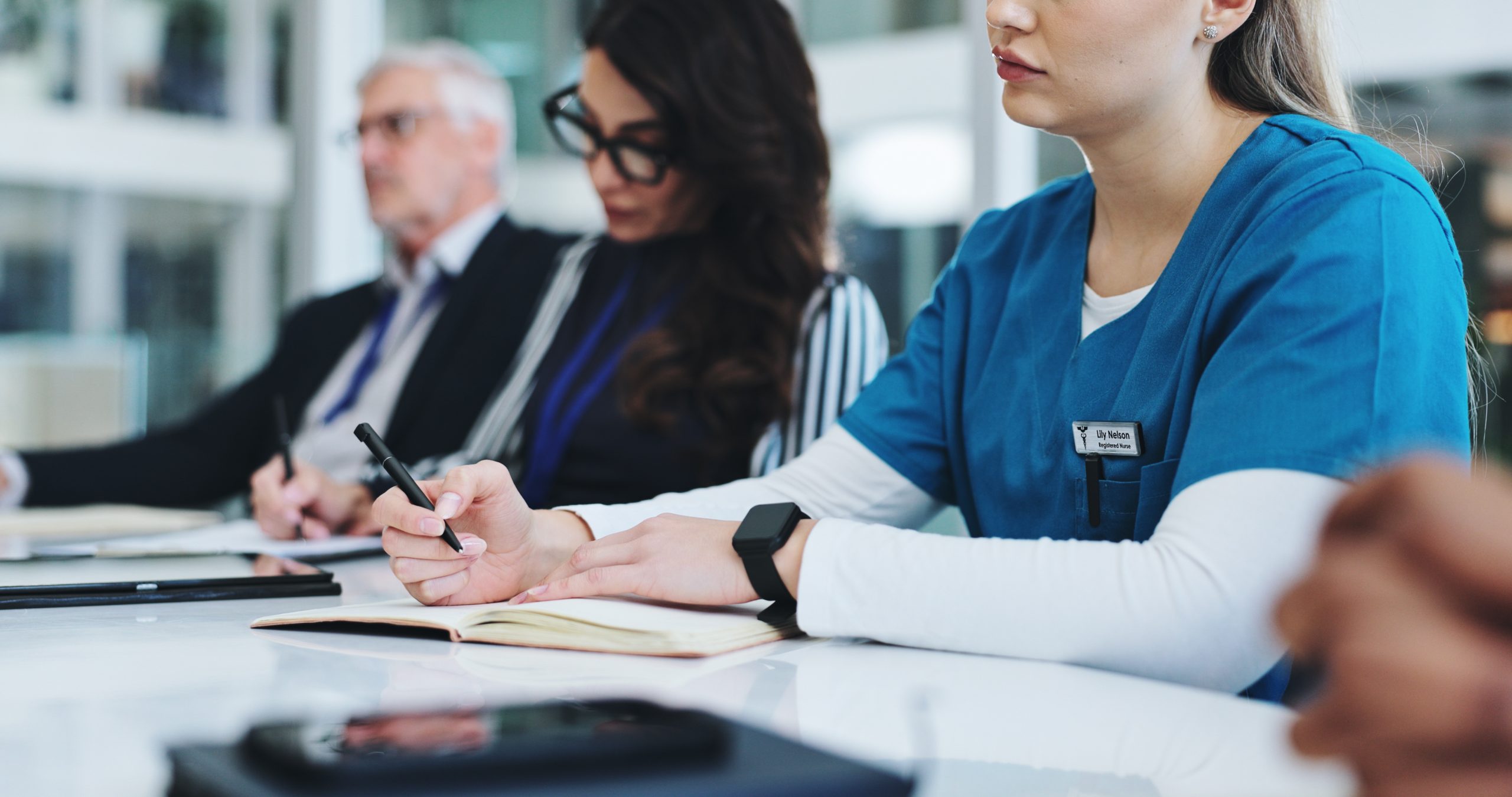 Writing notes, meeting and hands of doctors in hospital with research for IRB approval for surgery